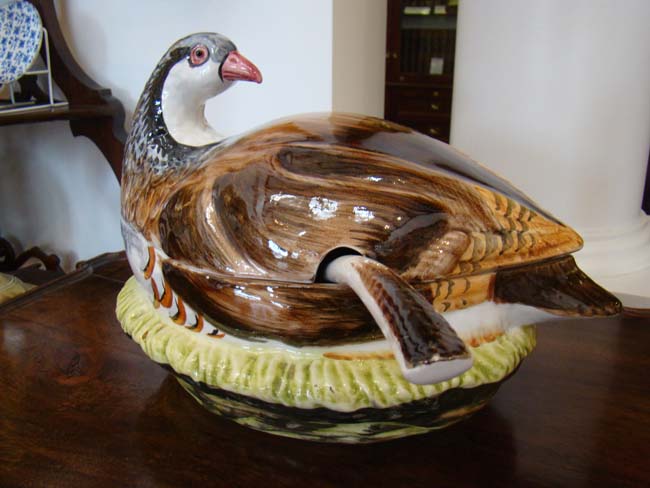 A beautiful vintage hand painted tureen in the form of a partridge